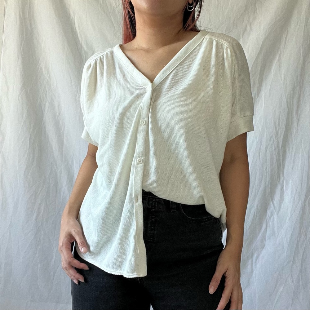 White knit button-up shortsleeved top